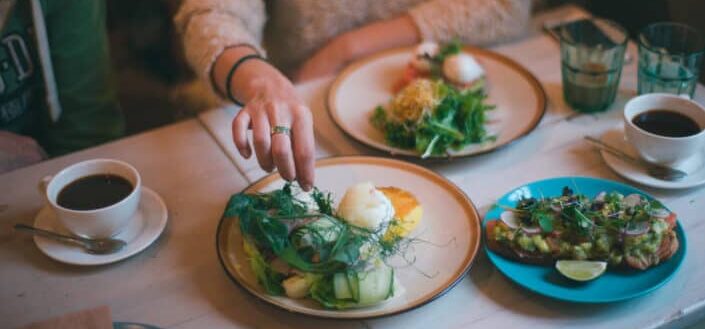 Adults who eat foods rich in vitamin K.